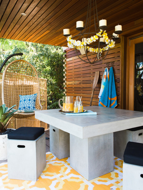 Beach Style Outdoor Design Ideas with concrete outdoor seating