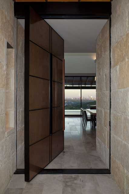 Custom contemporary designed door coverd with stones