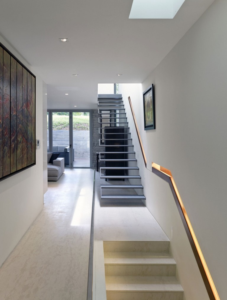 metal-staircase-beige-granite-floor