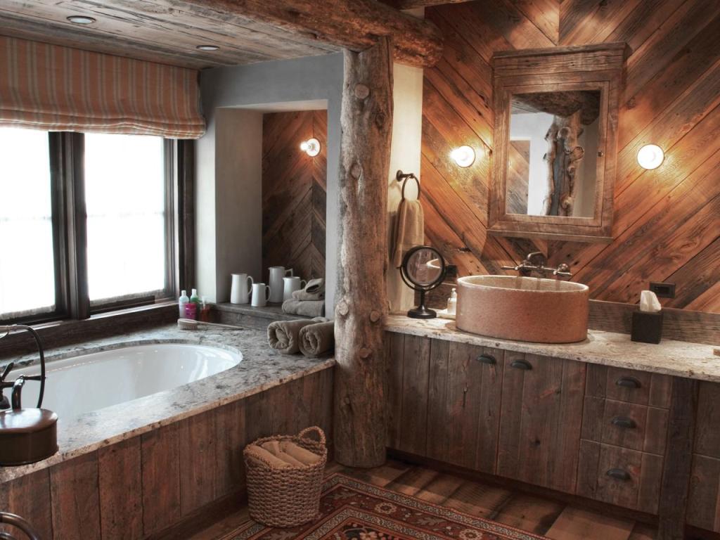 Rustic Bathroom With Wood Walls and Soaking Tub