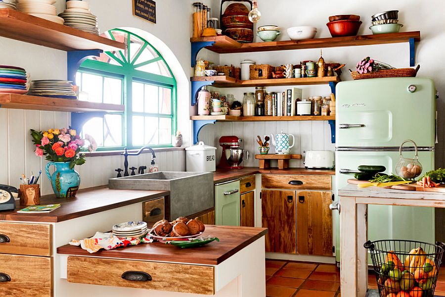 Wooden shelves and cabinet doors bring farmhouse charm to the eclectic kitchen