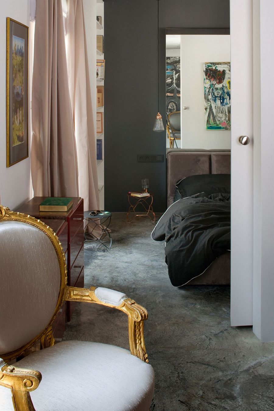 Bedroom of the tiny apartment with eclectic style