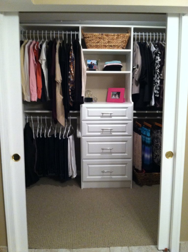 White Wooden Closet With Four Drawers And Grey Alumunium Cloth Hooks Complete With Racks