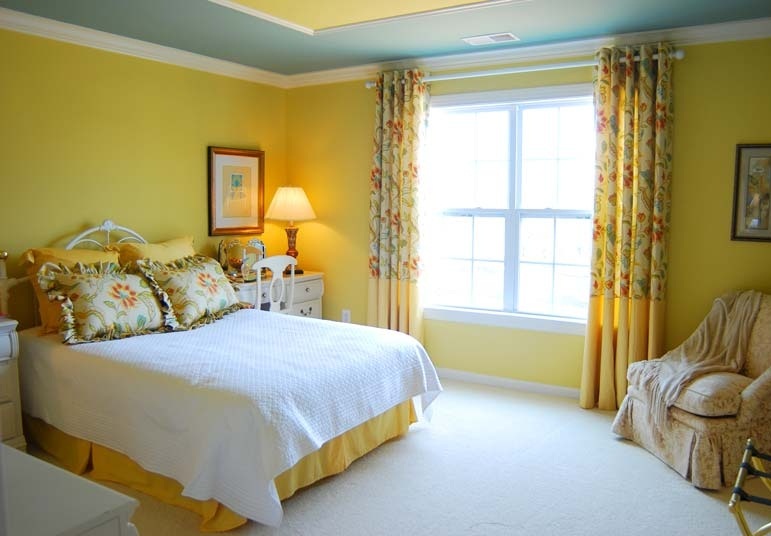 Chic Bedroom With Yellow Paint