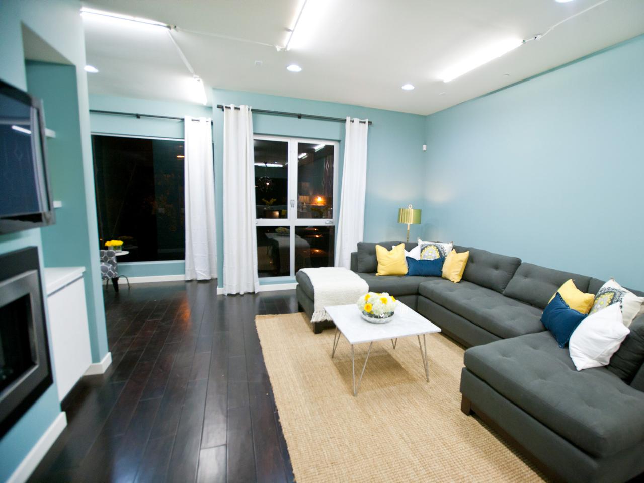 Modern Living Room With Blue Walls & Wood Floor