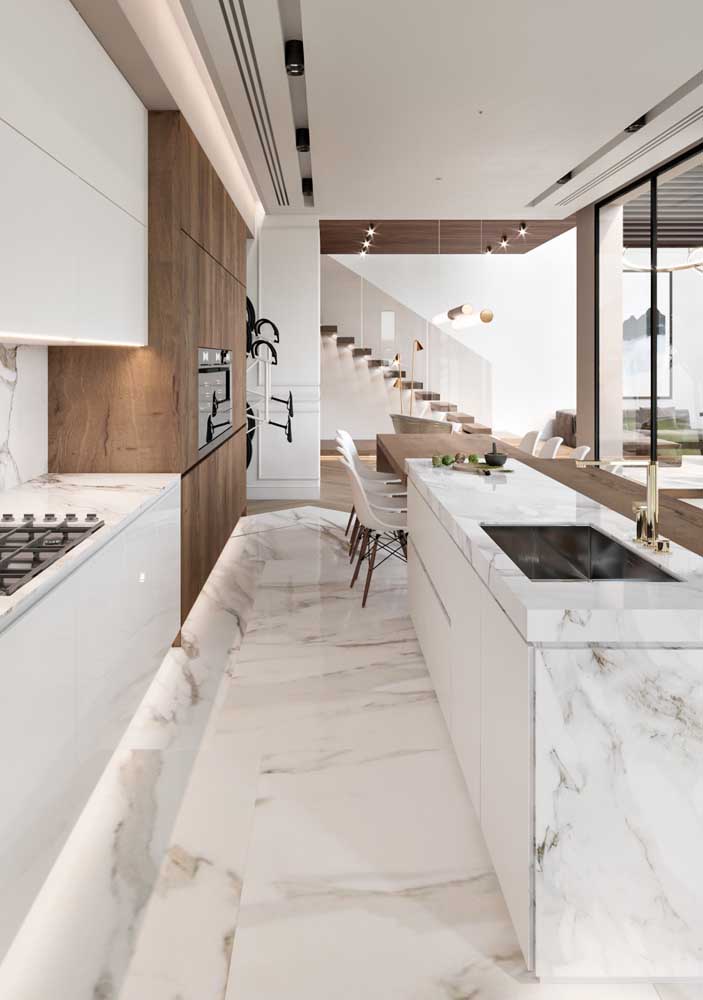 16. Kitchen with calaccata oro marble floor.