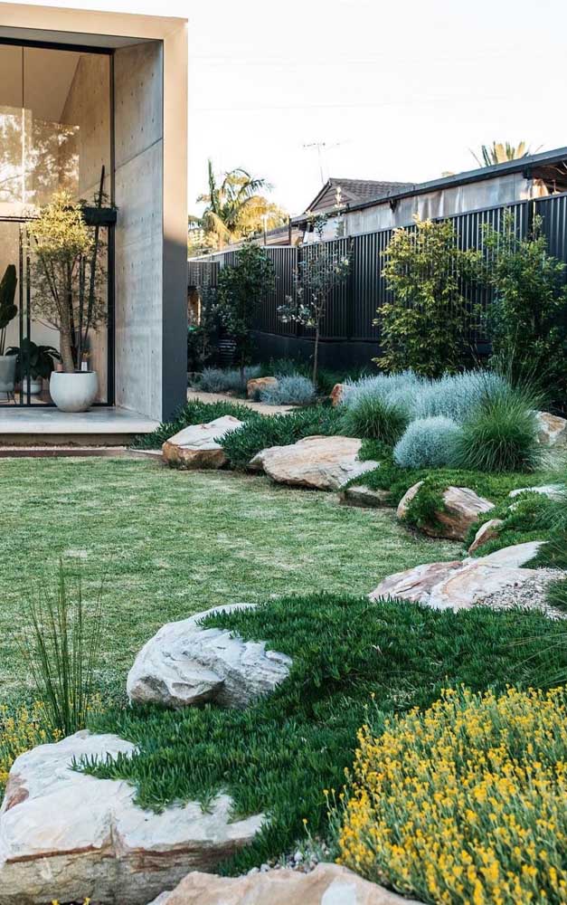 43. Natural rough stones surround this large front garden.